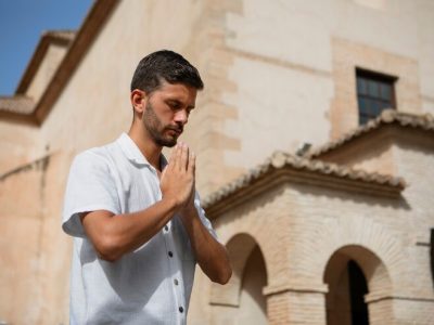 medium-shot-young-man-praying_23-2150755503